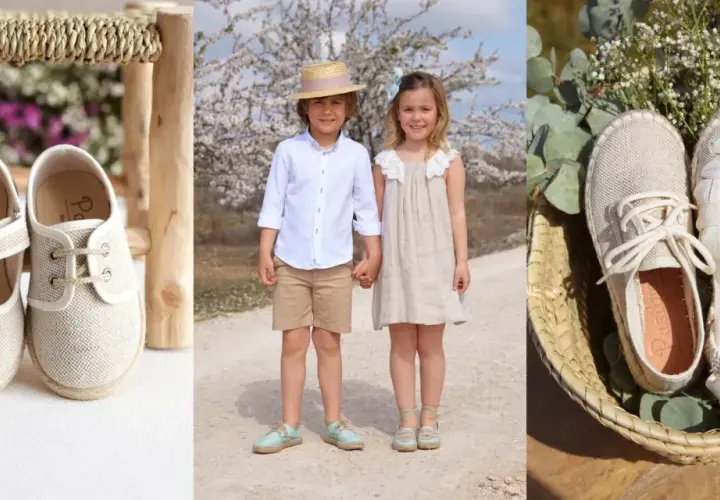 Un niño y una niña, como pajes, lucen calzado de esparto. Zapatos de tela y esparto en cestas y sobre un taburete.